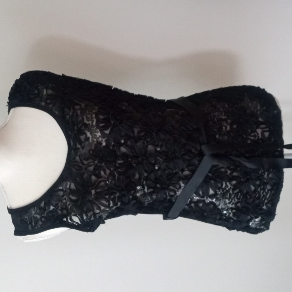 Sequins tank top, color black, size medium. Sheer.